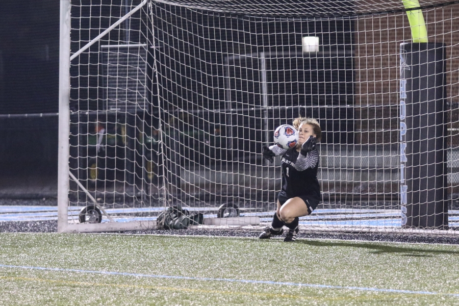 Sommer Denison ’18 saving a goal in a soccer shootout